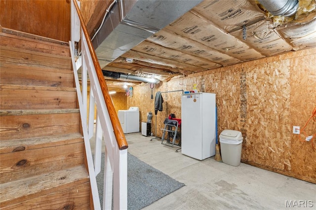 614 Main St, Keyesport, IL 62253 - unfinished below grade area featuring washer / clothes dryer, freestanding refrigerator, and stairs