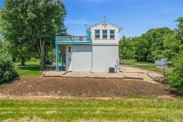 614 Main St, Keyesport, IL 62253 - back of property featuring a wooden deck