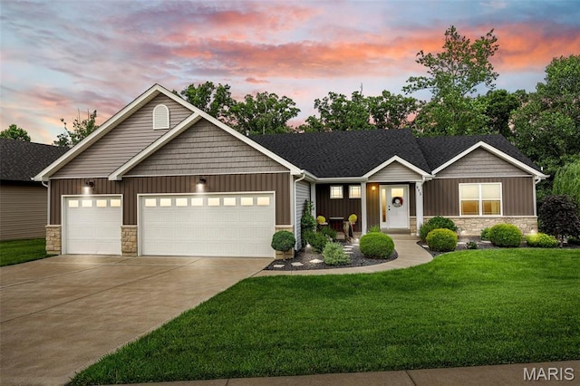 815 Mule Creek Dr, Wentzville, MO 63385 - view of front of house featuring stone siding, board and batten siding, a garage, concrete driveway, and a yard