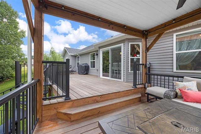 815 Mule Creek Dr, Wentzville, MO 63385 - deck with area for grilling and ceiling fan