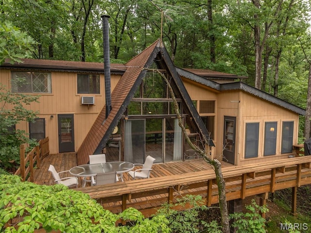 376 W Wanderfern Circle Dr, Innsbrook, MO 63390 - back of property featuring a deck and view of scattered trees