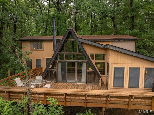 376 W Wanderfern Circle Dr, Innsbrook, MO 63390 - rear view of property featuring a deck and view of scattered trees