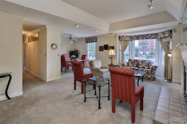 210 N Taylor Ave Unit C, Kirkwood, MO 63122 - carpeted living room featuring a ceiling fan, a fireplace with flush hearth, and crown molding