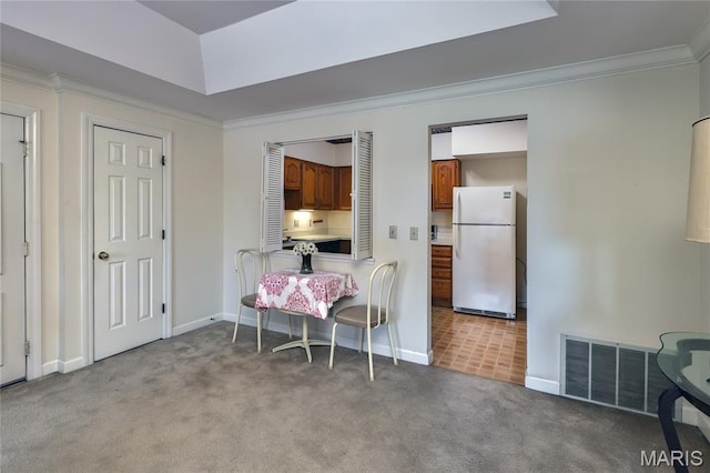 210 N Taylor Ave Unit C, Kirkwood, MO 63122 - dining room featuring light colored carpet and ornamental molding