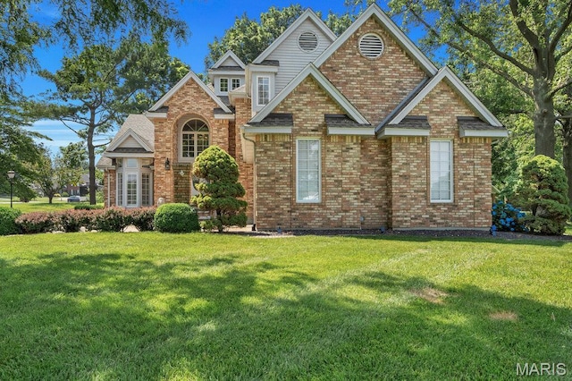 108 Lucys Lndg, Waterloo, IL 62298 - view of front of house featuring brick siding and a front yard