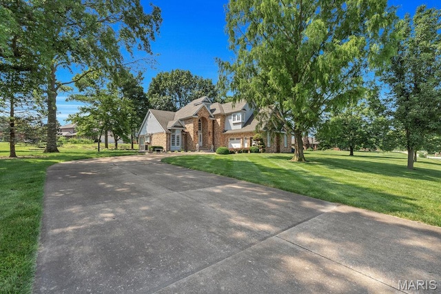 108 Lucys Lndg, Waterloo, IL 62298 - view of front of property featuring brick siding, a front lawn, and driveway