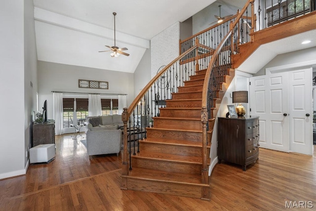 108 Lucys Lndg, Waterloo, IL 62298 - staircase featuring high vaulted ceiling, ceiling fan, wood finished floors, and beam ceiling