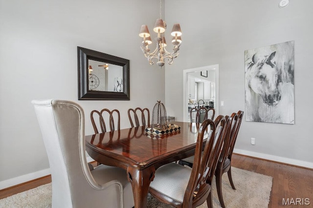 108 Lucys Lndg, Waterloo, IL 62298 - dining room with wood finished floors and a chandelier