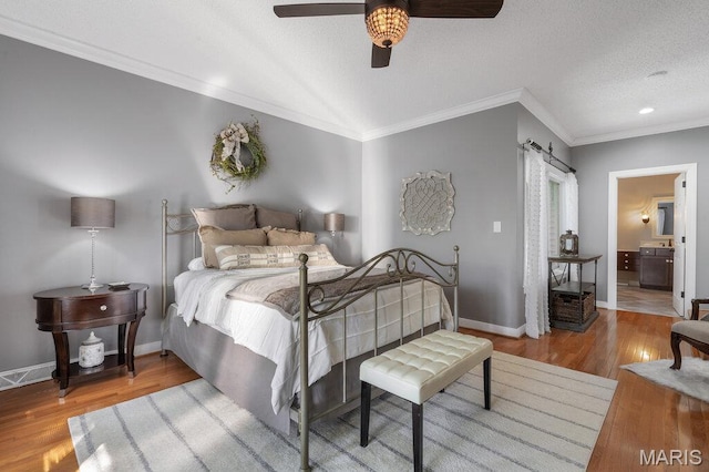 108 Lucys Lndg, Waterloo, IL 62298 - bedroom featuring wood finished floors, ornamental molding, a ceiling fan, and connected bathroom