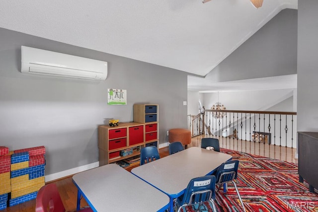 108 Lucys Lndg, Waterloo, IL 62298 - game room with an AC wall unit, vaulted ceiling, wood finished floors, and a ceiling fan