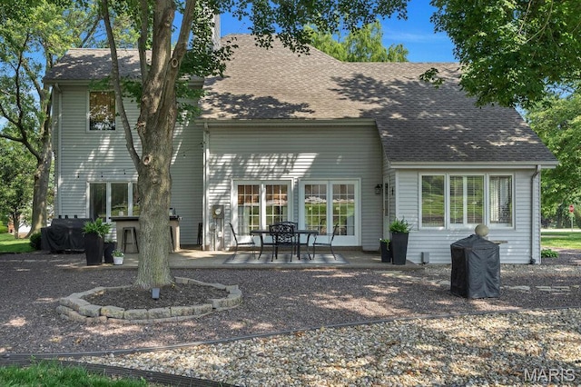 108 Lucys Lndg, Waterloo, IL 62298 - back of house with a patio and a shingled roof