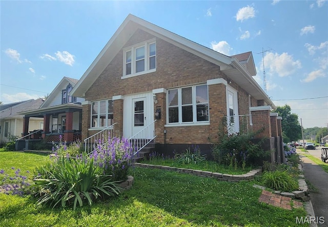 1629 Swanwick St, Chester, IL 62233 - view of front of house with brick siding and a front yard