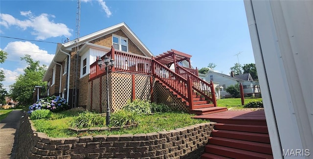 1629 Swanwick St, Chester, IL 62233 - view of side of home featuring stairs, brick siding, and a deck