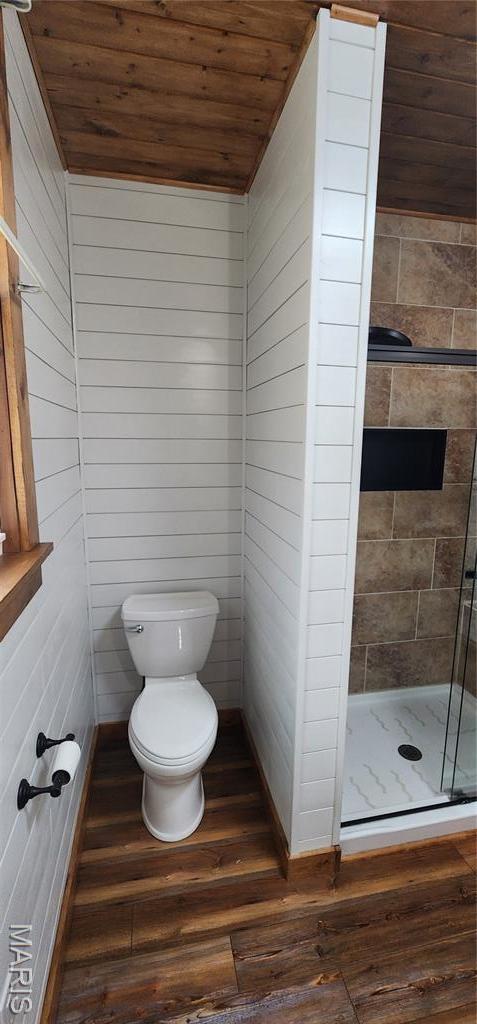1629 Swanwick St, Chester, IL 62233 - bathroom with wooden ceiling, toilet, wood finished floors, a shower stall, and wooden walls