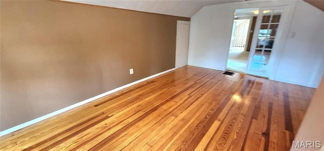 1629 Swanwick St, Chester, IL 62233 - additional living space with light wood-style flooring, lofted ceiling, and baseboards