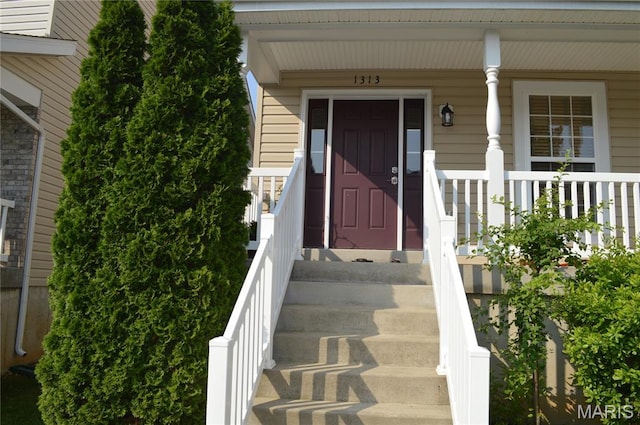 1313 Commons Cir, Cottleville, MO 63304 - doorway to property featuring covered porch