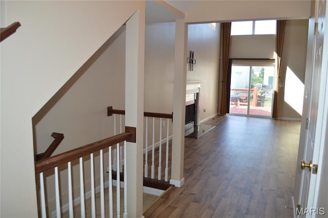 1313 Commons Cir, Cottleville, MO 63304 - hallway with wood finished floors and an upstairs landing
