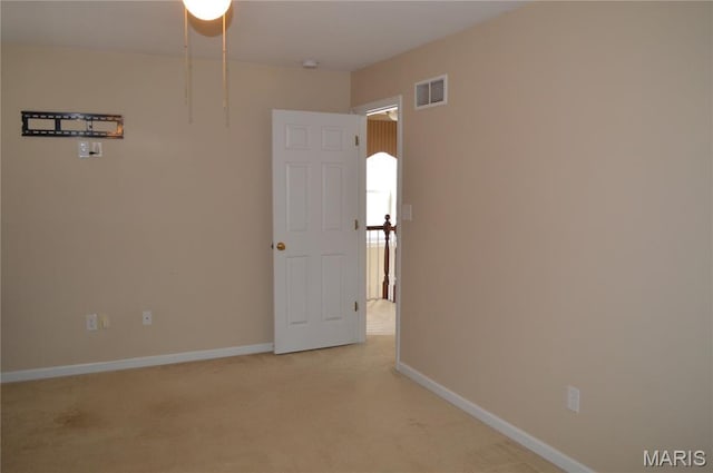 1313 Commons Cir, Cottleville, MO 63304 - empty room featuring light colored carpet and baseboards