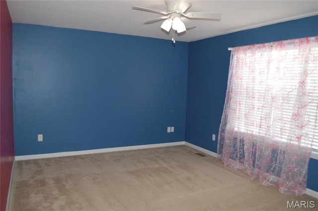 1313 Commons Cir, Cottleville, MO 63304 - unfurnished room with plenty of natural light, a ceiling fan, and carpet flooring