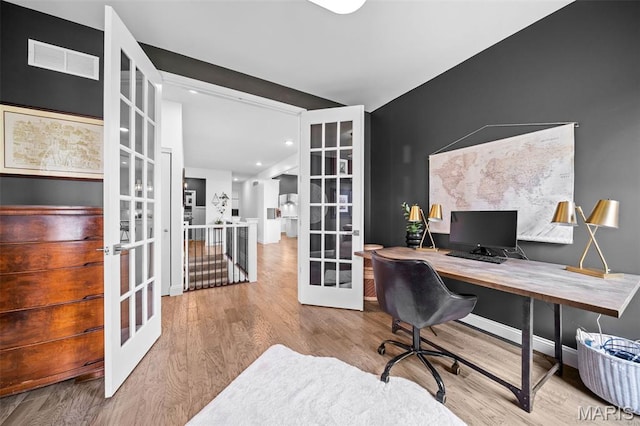 932 Colebrook Ct, Lake St Louis, MO 63367 - home office with french doors, wood finished floors, and recessed lighting