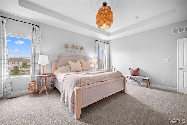 932 Colebrook Ct, Lake St Louis, MO 63367 - carpeted bedroom with a raised ceiling and baseboards