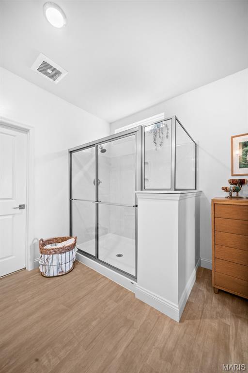 932 Colebrook Ct, Lake St Louis, MO 63367 - bedroom featuring wood finished floors and baseboards