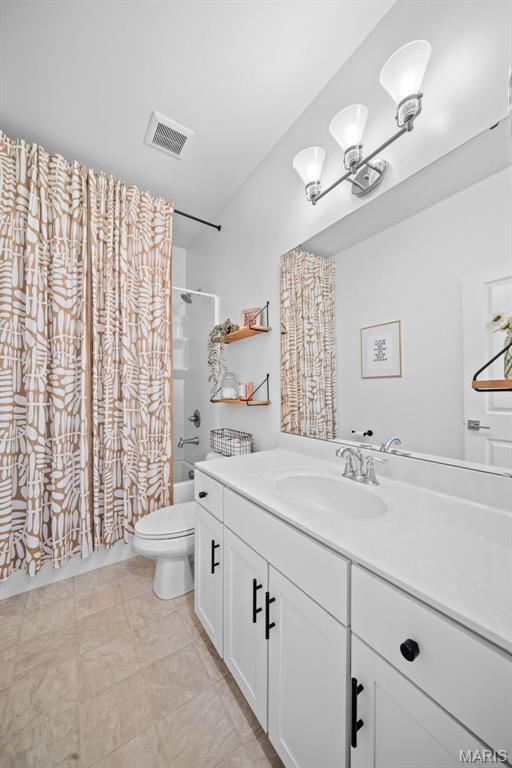 932 Colebrook Ct, Lake St Louis, MO 63367 - full bath featuring vanity and shower / bath combo with shower curtain