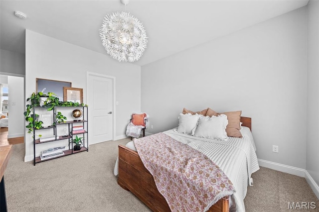 932 Colebrook Ct, Lake St Louis, MO 63367 - carpeted bedroom featuring a chandelier and baseboards