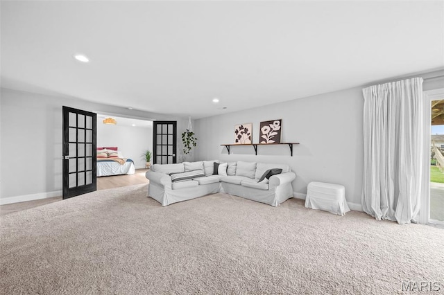 932 Colebrook Ct, Lake St Louis, MO 63367 - living room featuring french doors, recessed lighting, and carpet floors