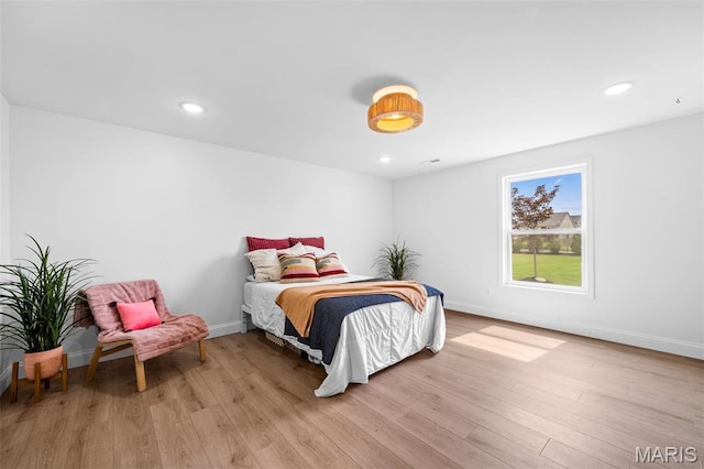 932 Colebrook Ct, Lake St Louis, MO 63367 - bedroom featuring light wood-type flooring and recessed lighting