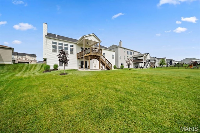 932 Colebrook Ct, Lake St Louis, MO 63367 - back of property featuring stairway, a deck, a lawn, and a residential view