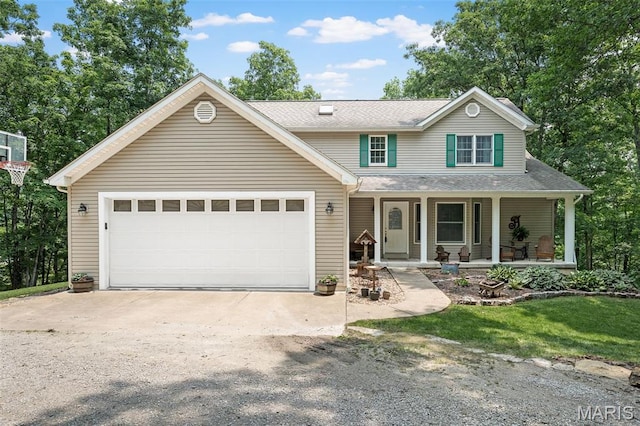 20220 Inverness Dr, Marthasville, MO 63357 - view of front facade with a porch, a garage, a shingled roof, and driveway