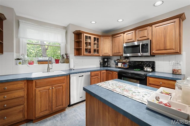 20220 Inverness Dr, Marthasville, MO 63357 - kitchen featuring stainless steel appliances, open shelves, dark countertops, and recessed lighting