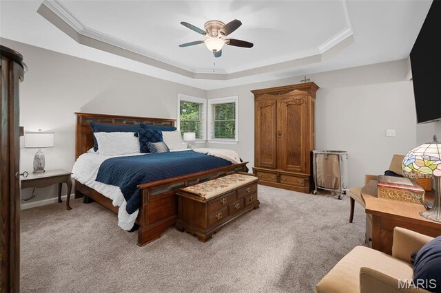 20220 Inverness Dr, Marthasville, MO 63357 - bedroom featuring a tray ceiling, light colored carpet, ornamental molding, and a ceiling fan