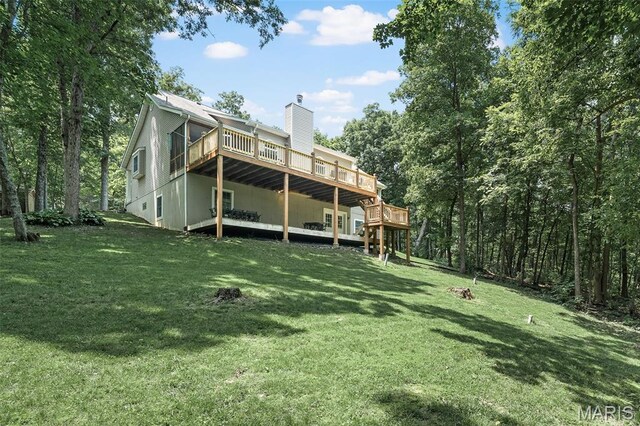 20220 Inverness Dr, Marthasville, MO 63357 - rear view of property featuring a wooden deck, a lawn, and a chimney