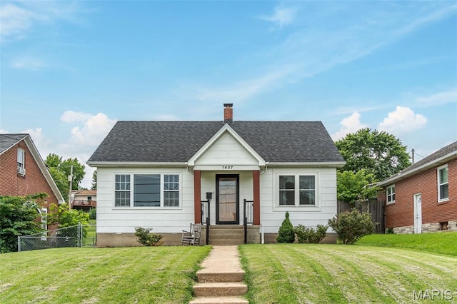 1407 E 5th St, Washington, MO 63090 - bungalow with a chimney and a shingled roof