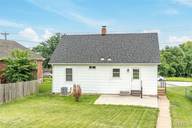 1407 E 5th St, Washington, MO 63090 - rear view of house with entry steps, a patio, a shingled roof, and a chimney