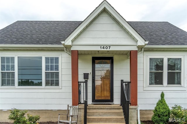 1407 E 5th St, Washington, MO 63090 - property entrance with a shingled roof