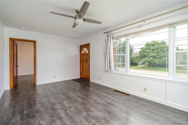1407 E 5th St, Washington, MO 63090 - spare room with dark wood-style flooring and a ceiling fan