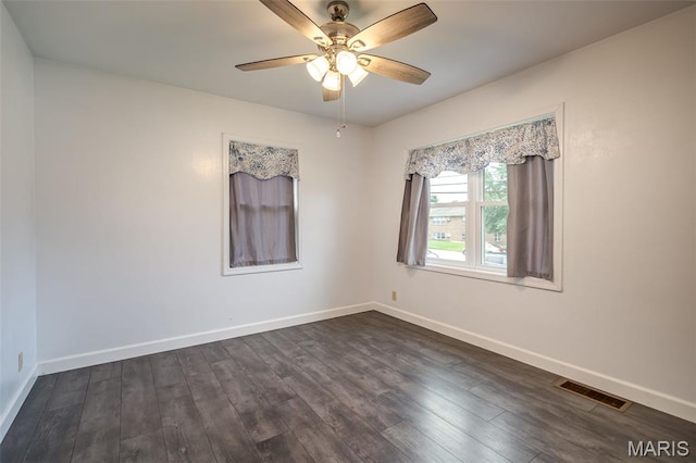 1407 E 5th St, Washington, MO 63090 - spare room featuring ceiling fan and dark wood finished floors