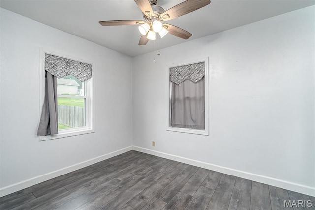 1407 E 5th St, Washington, MO 63090 - unfurnished room featuring dark wood finished floors and ceiling fan