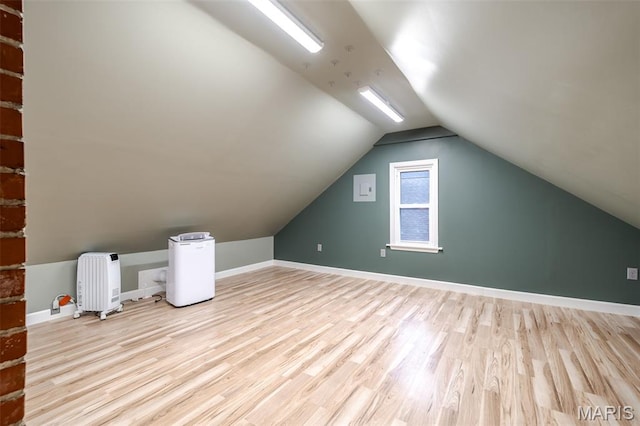 1407 E 5th St, Washington, MO 63090 - bonus room with wood finished floors and vaulted ceiling