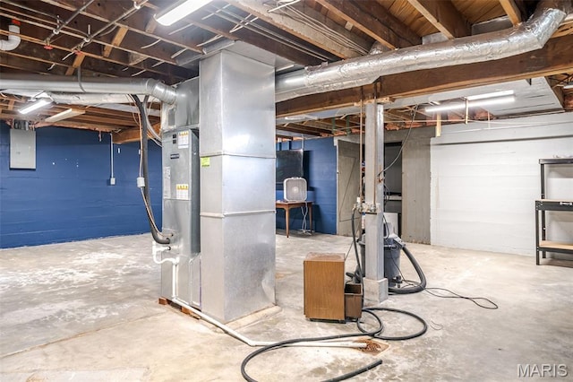 1407 E 5th St, Washington, MO 63090 - unfinished basement featuring electric panel and heating unit
