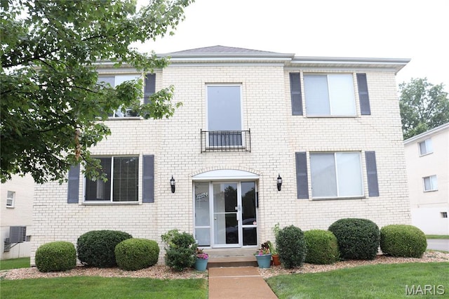 12574 Chardin Pl Unit 1, Tesson Ferry Township, MO 63128 - view of front of house featuring brick siding