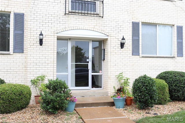 12574 Chardin Pl Unit 1, Tesson Ferry Township, MO 63128 - property entrance featuring brick siding