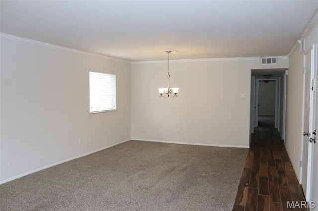 12574 Chardin Pl Unit 1, Tesson Ferry Township, MO 63128 - spare room featuring crown molding, a chandelier, and dark wood-style floors