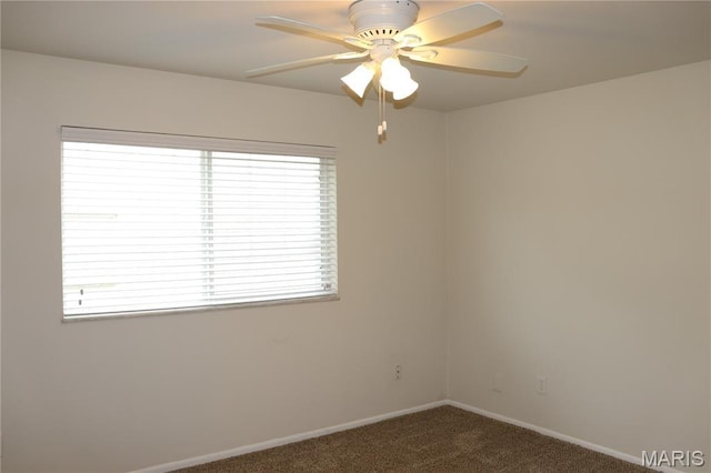 12574 Chardin Pl Unit 1, Tesson Ferry Township, MO 63128 - spare room with dark carpet, plenty of natural light, and ceiling fan