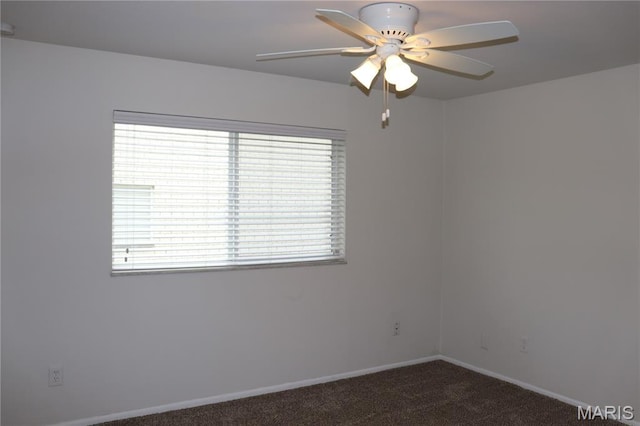 12574 Chardin Pl Unit 1, Tesson Ferry Township, MO 63128 - empty room with dark colored carpet and a ceiling fan