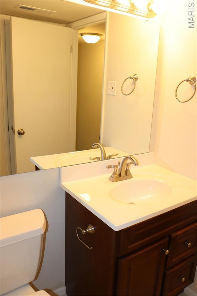 12574 Chardin Pl Unit 1, Tesson Ferry Township, MO 63128 - half bath featuring vanity and toilet