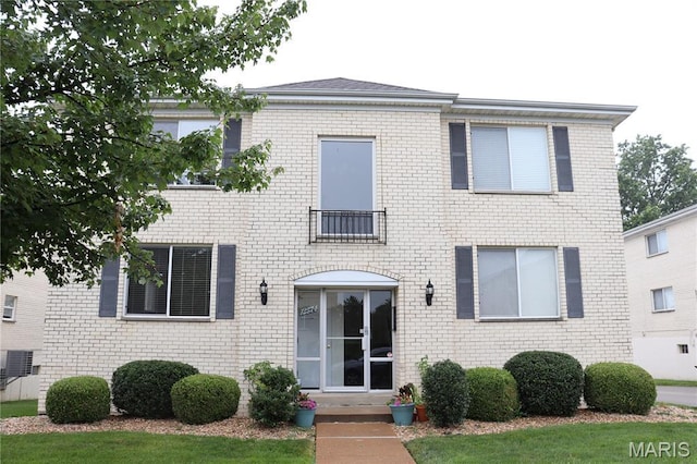 12574 Chardin Pl Unit 1, Tesson Ferry Township, MO 63128 - view of front facade with brick siding